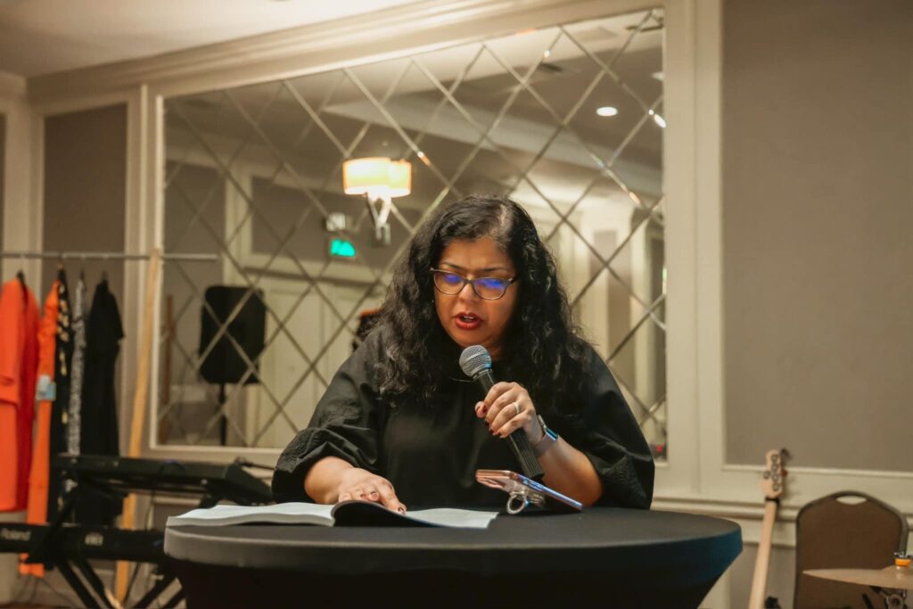 Minister Ivonne Moose leading the group in soul healing and deliverance prayer.