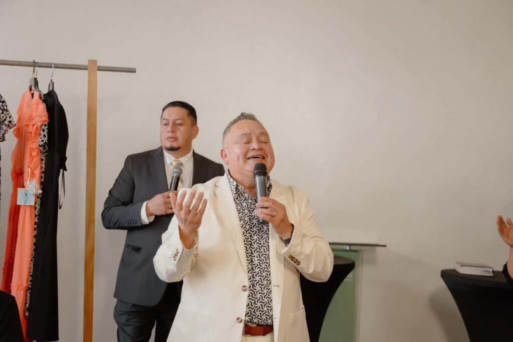 Apostle Eddie leading prayer, Day 1.